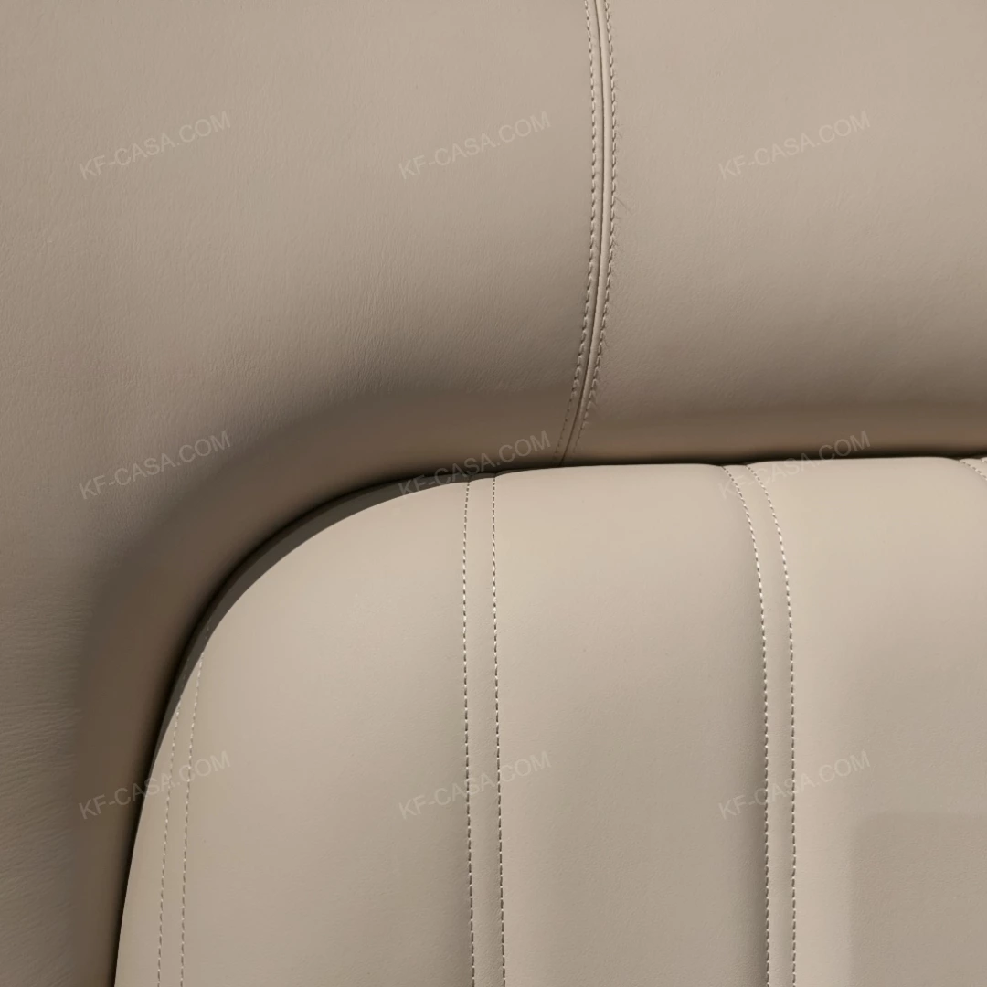 Cream Upholstered Bed with Decorative Accent Trim, Brand Emblem & Gold Stainless Steel Feet